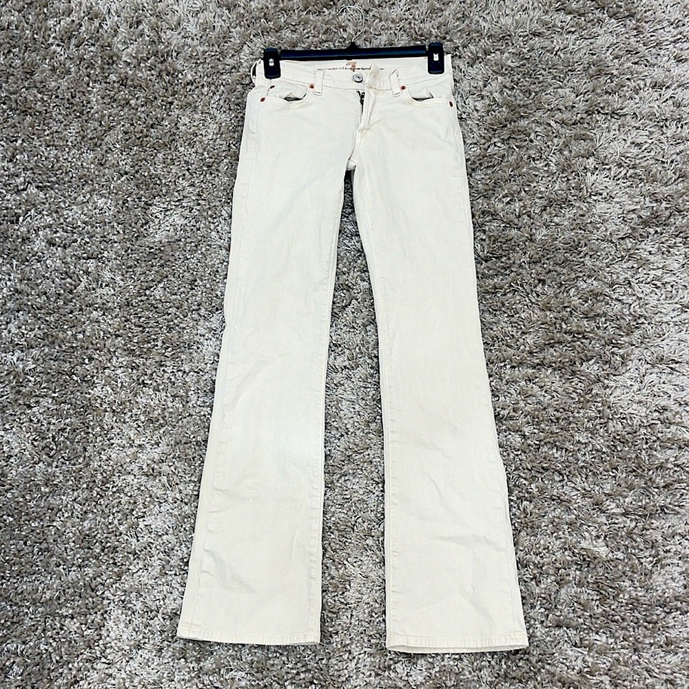 Low waisted, cream color boot cut jeans!